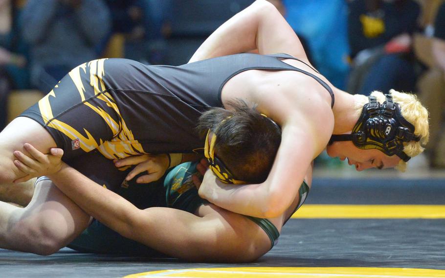 Patch's Eli Spencer, top, beat Alconbury's Christian Dufresne to take the 195-pound title at the DODDS-Europe wrestling championships in Wiesbaden, Germany, Saturday, Feb. 14, 2015.