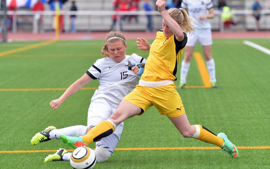 Ramstein's Dominique Dubois, left, and Patch's Lauren Rittenhouse fight for a ball in last year's Division I final at the DODDS-Europe soccer championships in Kaiserslautern, Germany. Rittenhouse has graduated, but Dubois will return as the Royals try to defend their division crown.