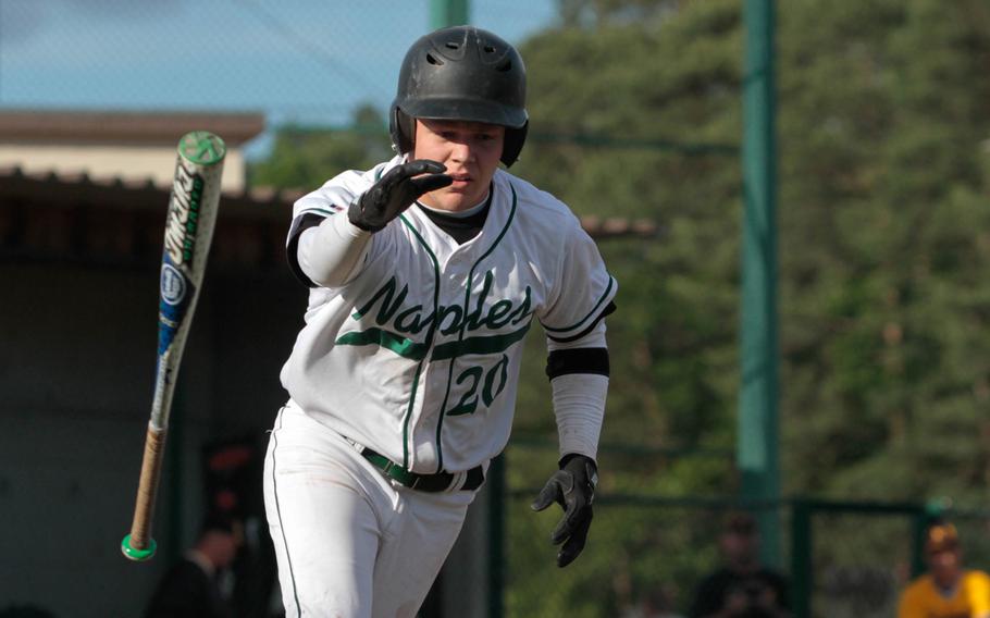 Naples' George Shaffer tosses his bat on his way to first base in his team's 11-4 win over Vicenza for the 2014 DODDS-Europe Division II baseball championship. Shaffer will be returning for the Wildcats this season.