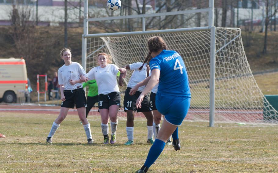 Ramstein's Lakyn Parker scores on a direct kick in the first half of the Royal's 7-0 victory over the Vilseck Falcons on Mar. 21, 2015. 