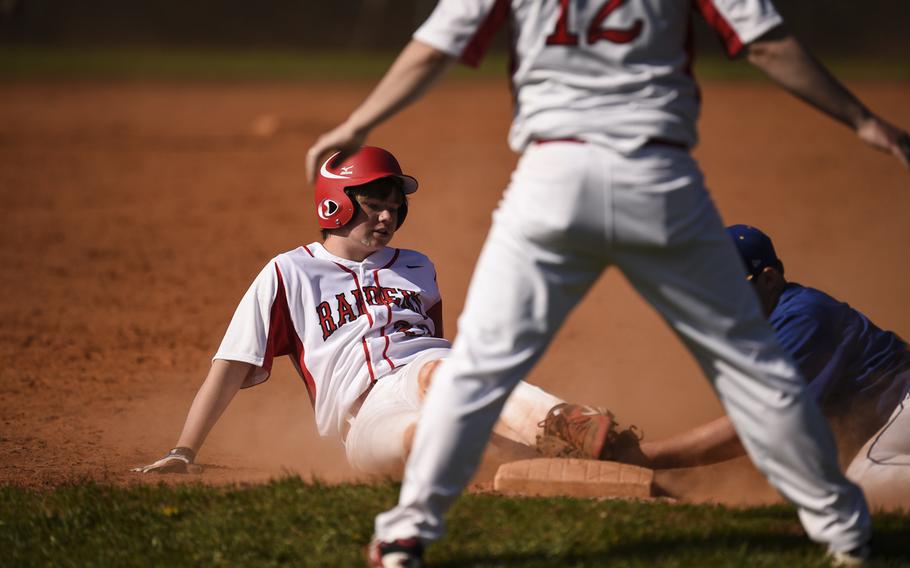 Kaiserslautern's J.P. Oppenheim waits for the umpire to make a call after sliding into third base on a long drive to right field Wednesday against Wiesbaden at Kaiserslautern, Germany.