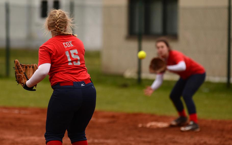 Lakentheath's Shannon Cox throws to first for an out against Ramstein on Friday, May 1, 2015 at Ramstein, Germany.
