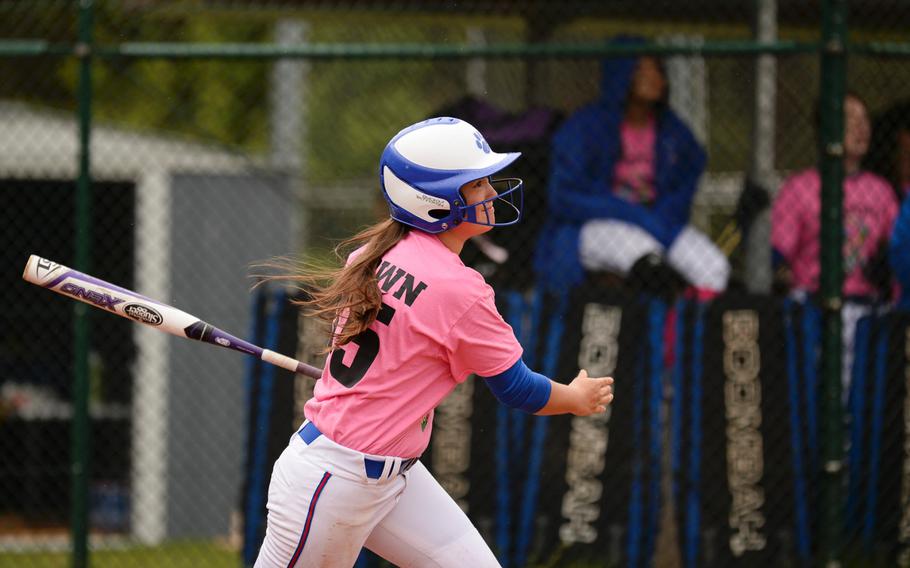 Ramstein's Brittany Crown gets a base hit against Lakenheath on Friday, May 1, 2015 at Ramstein, Germany.