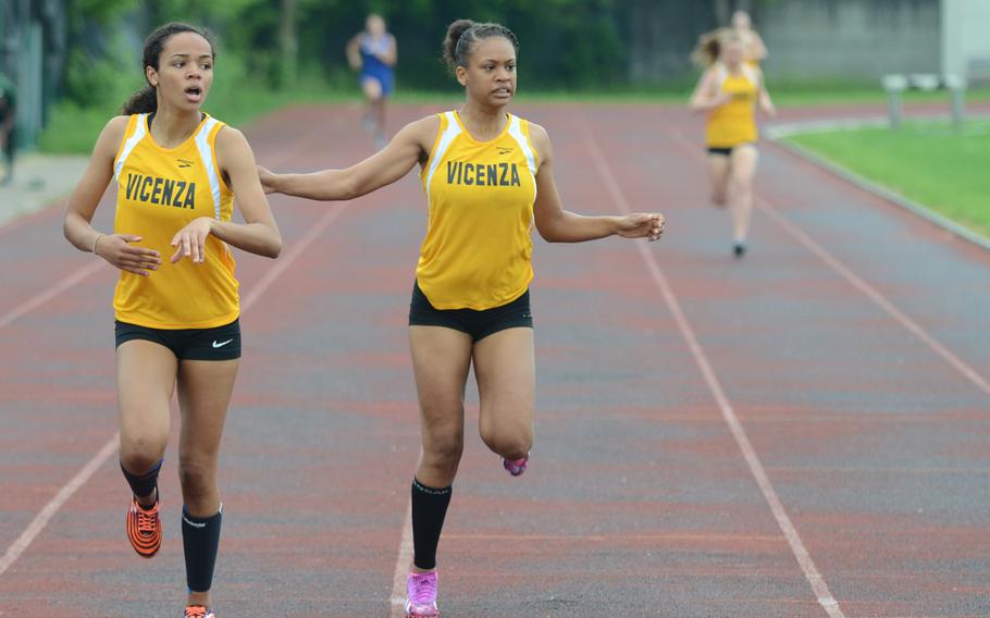 Vicenza's Mariah McCarroll and Altasia Thompson react as they see McCarroll's time during the 400 meters Saturday at Creazzo, Italy. McCarroll ran 1 minute, 3.84 seconds and Thompson ran 1:04.15.