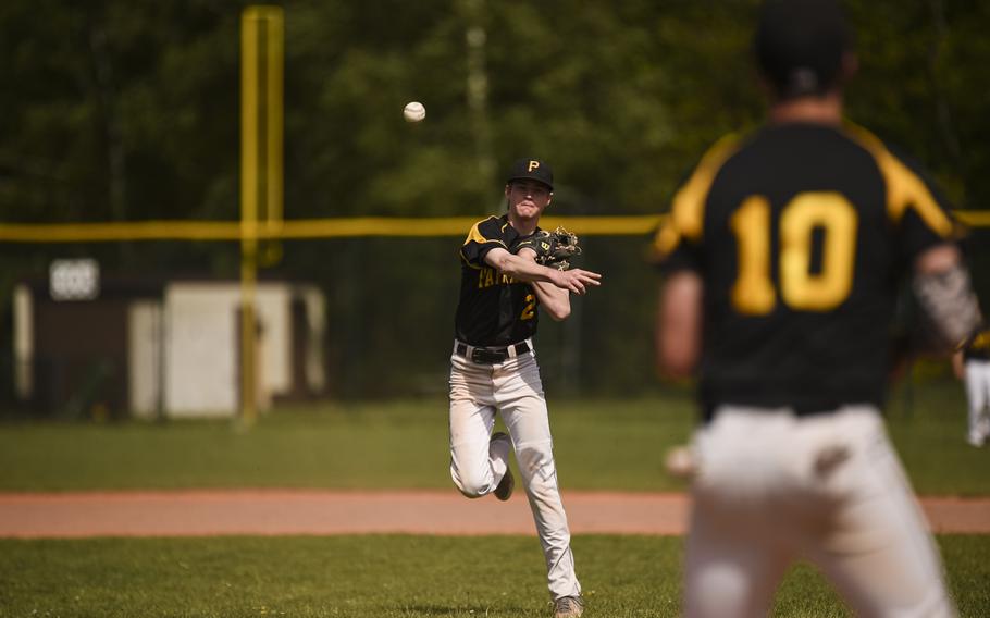 Patch's R. Marshall throws to first for an out against Ramstein at Ramstein, Germany, Saturday, May 9, 2015.