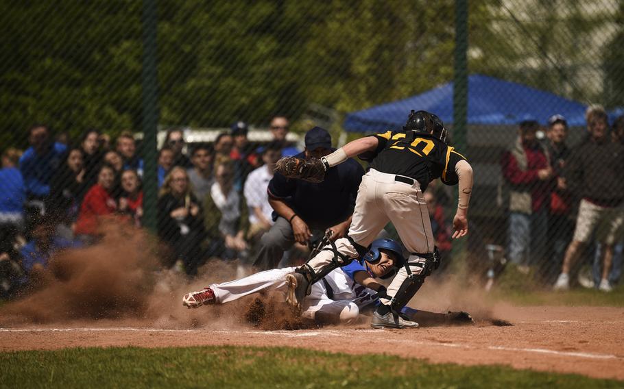 Ramstein's Jonny Oswald is tagged out at home plate against Patch at Ramstein, Germany, Saturday, May 9, 2015.