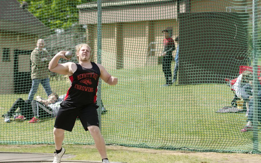 Menwith Hill's Jonathon Brugman throws a shot put during a track meet at RAF Lakenheath on Saturday, May 16, 2015. Brugman took first.