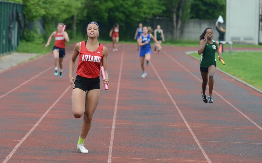 Aviano's Taja Dotson anchors her team to a 54.78-second 4x100 relay win during a May 2 track meet at Creazzo, Italy. The Saints could battle Ansbach for the team title in Division II.