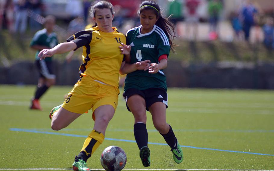 Patch's Julia Smith tries to get a shot off against Naples defender Amanda Ortega in a Division I semifinal at the DODDS-Europe soccer championships at Reichenbach, Germany. Patch won 4-0 to advance to Thursday's final against Ramstein.
