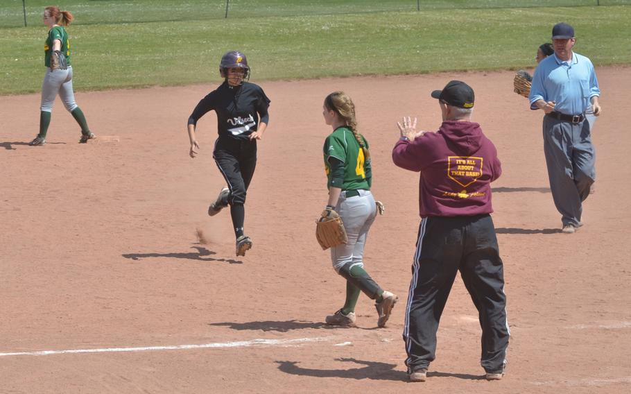 Vilseck's Madison Mix runs to third after driving a ball deep in the outfield for a triple in the 3rd inning of her team's game against SHAPE.