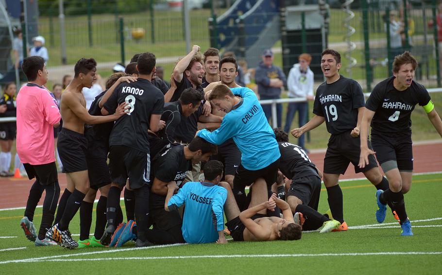 The Bahrain team celebrates its Division II boys title after beating Marymount in a shootout at the DODDS-Europe soccer championships in Kaiserslautern, Germany.