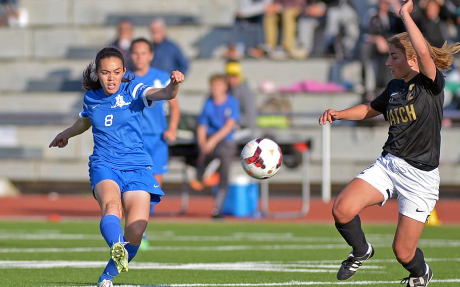 Ramstein's Liana Ochoa shoots past Patch's Kaela Lynch in the girls Division I final at the DODDS-Europe soccer championships in Kaiserslautern, Germany. Patch won 2-1 in overtime.
