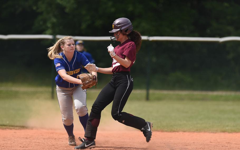 Wiesbaden'sJacqueline Workman rushes to tag a Vilseck runner in day two of the DODDS-Europe softball championships.