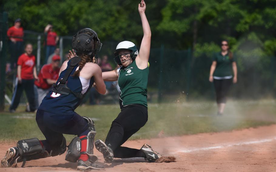 Naples' Anna Guaghen is tagged out at the plate in her team's pool play game against Lakenheath in day-two action at the DODDS-Europe softball championships.