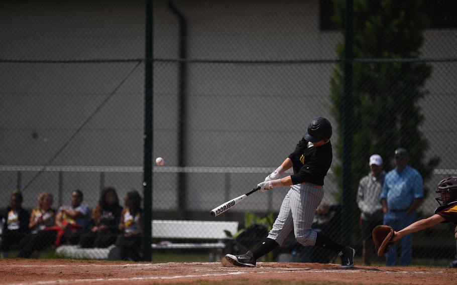 Vicenza's Levi Martin crushes an over-the-fence home run against Vilseck in day-two action in the DODDS-Europe baseball championships. 