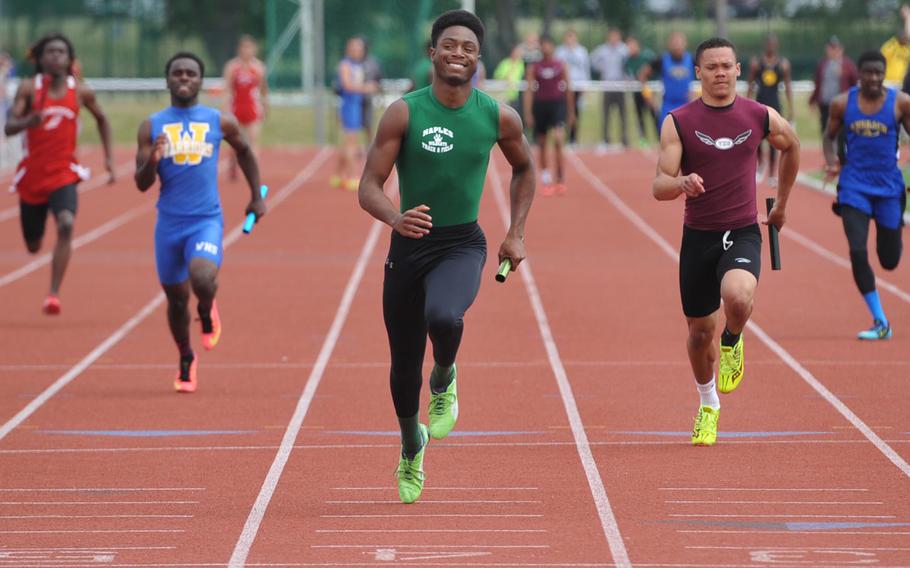 Cameron Copeland crosses the finish line as he anchors the Naples boys in the 4x100-meter relay. Copeland and teammates A.J. Fisher, Nick Snider and Turon Palmer won in 43.55 seconds.
