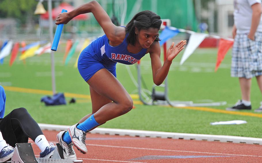 Ramstein's lead-off runner Yhari Dupree explodes off the blocks as her team broke the DODDS-Europe record in the 4x100-meter relay at the DODDS-Europe track and field championships in Kaiserslautern, Germany, Saturday, May 23, 2015. Along with teammates Brittany Highly, Sinoda Emanuel and Denee Lawrence they won in 48.45 second cracking Nuremberg's record set in 1984.