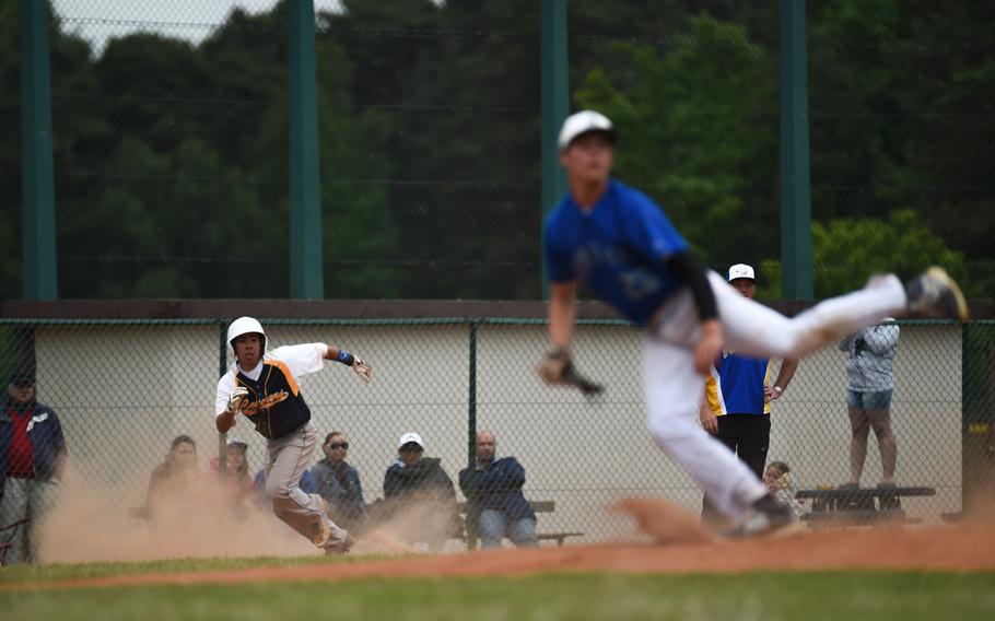 Ansbach senior Pedro Colon breaks for home before rushing back to third in the Cougars' 12-5 loss to Rota in the DODDS-Europe Division II/III final Saturday at Ramstein Air Base.