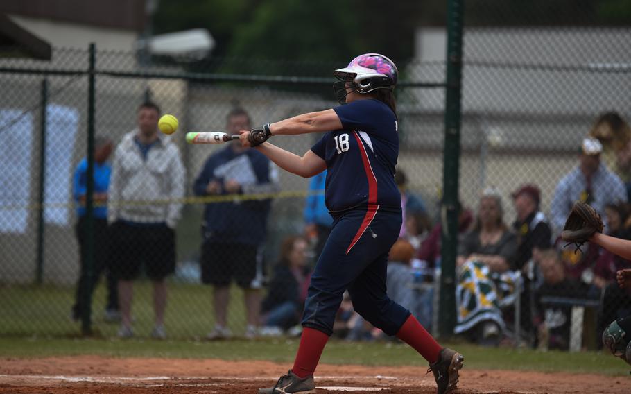Aviano sophomore McKenzie Milligan crushes the ball to center field in the Saints 8-3 victory over ALconbury for the 2015 DODDS-Europe softball crown.
