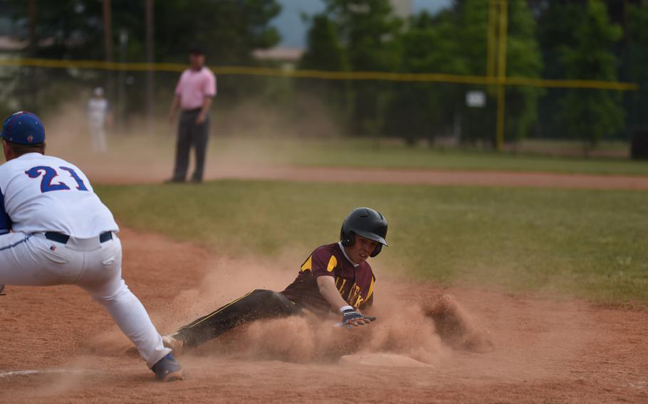 Vilseck senior Caleb Miller slides into third in the final inning of the Falcons' 27-1 loss to Ramstein for the 2015 DODDS-Europe Division I baseball title.