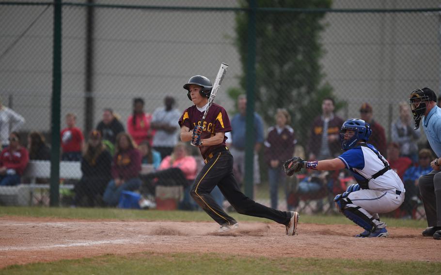 Vilseck senior Caleb Miller smacks a single in the final inning of the Falcons' 27-1 loss to Ramstein for the 2015 DODDS-Europe Division I baseball title.