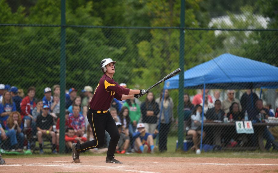 Vilseck senior Kurt Hall smashes a home run over the right field fence for Vilseck's only run in its 27-1 loss to Ramstein for the DODDS-Europe Division I baseball title.