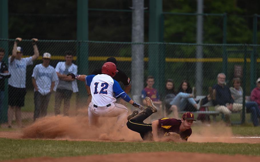 Ramstein senior Antonio Ortiz slides into third in the Royals' 27-1 drubbing on Vilseck for the Division I DODDS-Europe baseball championship.
