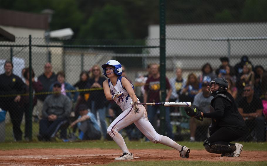 Ramstein's Zania Sterling dings a short looper for a single in the final inning of Ramstein's 7-6 victory over Vilseck for the DODDS-Europe Division I softball title.