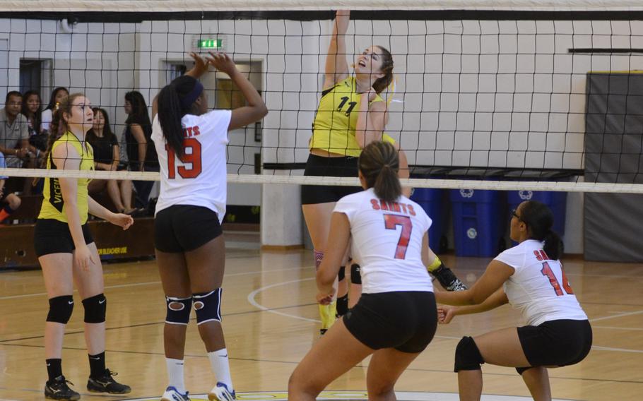 Vicenza's Brianna Baker spikes the ball for a point Saturday, during a match against Aviano at Vicenza, Italy.