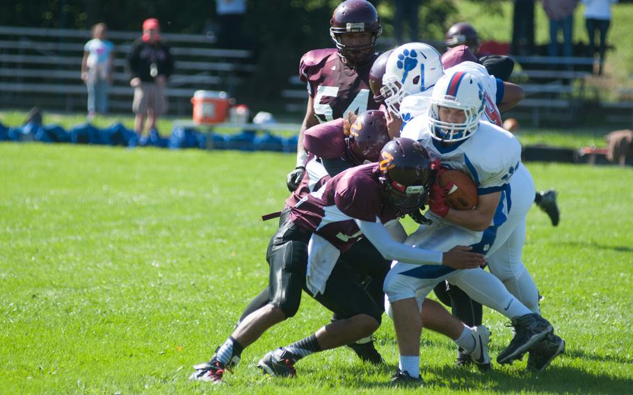 Both the Falcons and the Royals' defensive squads were the highlights of the DODDS-Europe Division I season opener held in Vilseck, Germany, Sept. 19, 2015. 