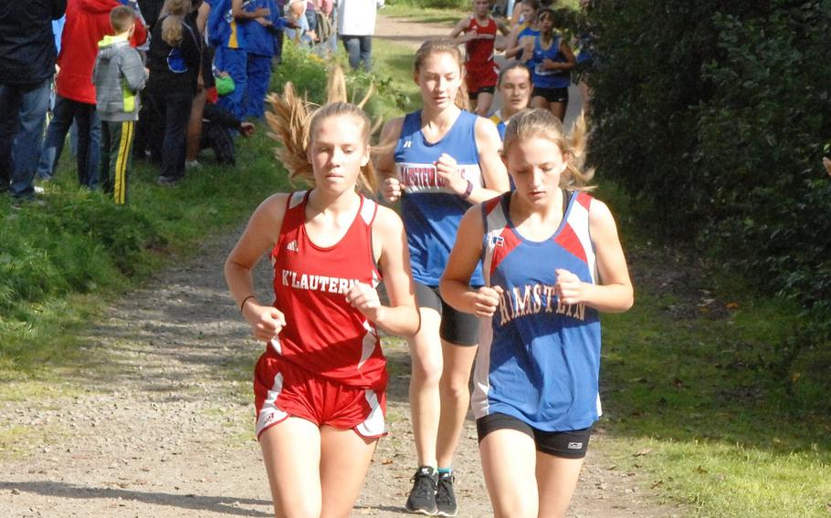 Girls cross country competitors round a corner in a six-school race Saturday, Sept. 26, 2015, at Ramstein-Miesenbach, Germany. Wiesbaden won the girls race ahead of host Ramstein.
