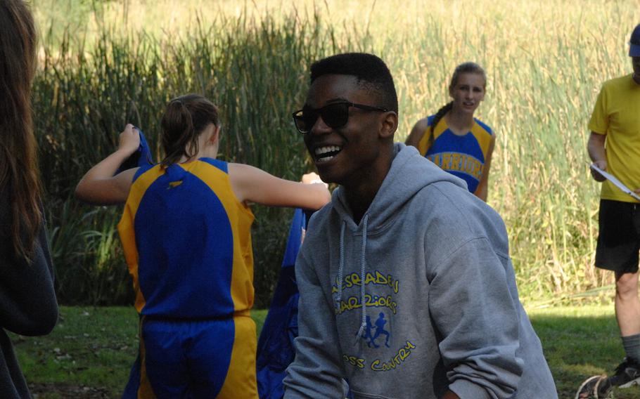 Sidney Perry laughs with teammates after winning a six-school boys cross country race Saturday, Sept. 26, 2015, at Ramstein-Miesenbach, Germany. The senior transferred to Wiesbaden from Florida this summer. 
