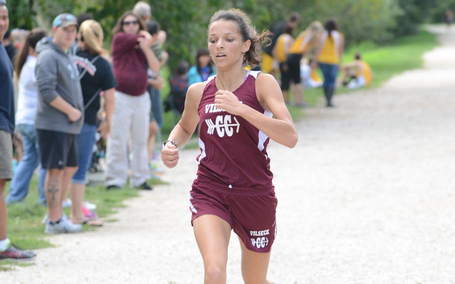 Vilseck's Kaili Markley is the first runner to cross the finish line Saturday during a DODDS-Europe cross country season opener near Vicenza, Italy. Markley ran the route in 19 minutes and 38 seconds.