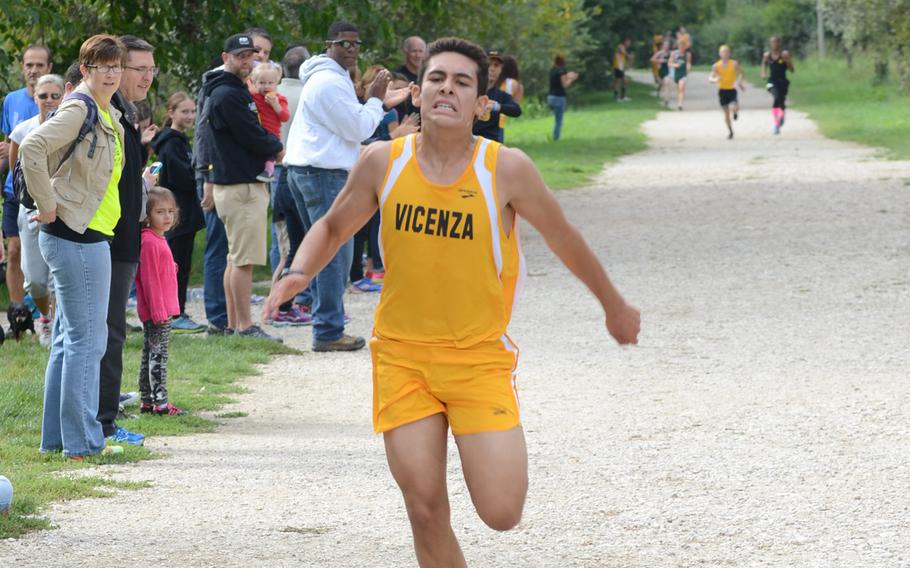 Vicenza's Josh Wilson pushes himself to the finish line with a time of 17 minutes and 54 seconds Saturday during a DODDS-Europe cross country season opener near Vicenza, Italy.