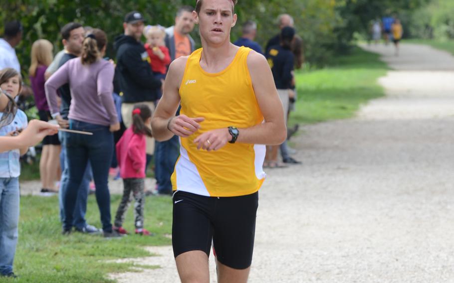 Stuttgart's Hunter Ficenec is the first runner to cross the finish line Saturday during a DODDS-Europe cross country season opener near Vicenza, Italy. Ficenec ran the route in 15 minutes and 58 seconds.