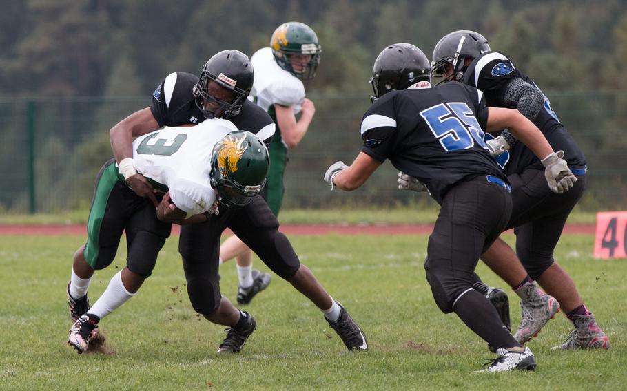 The Alconbury Dragons fell to the Hohenfels Tigers 43-0 during the second game of the 2015 DODDS-Europe Division II football season, Sept. 26, 2015. Here, Adarius Gallon is wrapped up for a loss. 