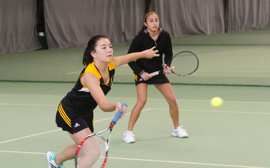 Hannah Cahill of Stuttgart hits a forehand as teammate Marissa Encarnacion looks on during a match against Wiesbaden in Wiesbaden Saturday, Sept. 26, 2015.