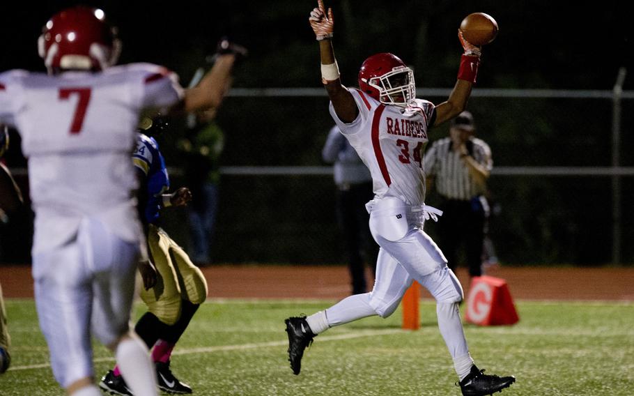 Kaiserslautern's David Zaryczny scores a touchdown during a football game in Wiesbaden, Germany, Friday, Oct. 2, 2015. Zaryczny scored the visiting Raider's only points, and the Raiders lost to Wiesbaden 34-6.