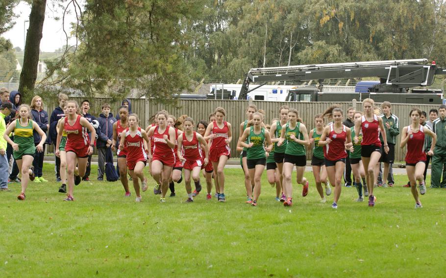 Girls take off from the starting line during a cross country meet at RAF Lakenheath on Saturday, Oct. 17, 2015. ISB's Rose Gray came in first with a time of 22 minutes.