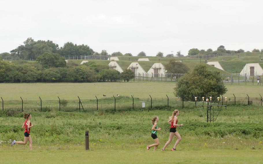 Girls run the first lap during a cross country meet at RAF Lakenheath on Saturday, Oct. 17, 2015. SHAPE's team took first at the meet.