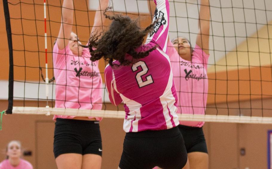 Vilseck's Adely Huezo elevates for a spike during the Falcons loss to Wiesbaden during a DODDS-Europe Division I girls volleyball tournament at Vilseck, Germany, Oct. 17, 2015.