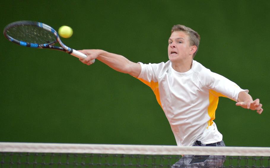 Vicenza's Will Auchincloss stretches to return a shot from a Hohenfels player in second-round doubles match at the DODDS-Europe tennis championships in Wiesbaden, Germany, Oct. 29, 2015. Auchincloss and partner Damian Rouse fell to Ian Rodman and Chris Lucious 6-1, 6-4.