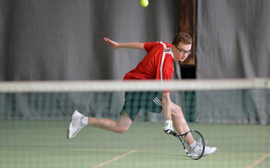 Kaiserslautern's James Butler runs down a shot by John Sullivan of Naples in opening-day action at the DODDS-Europe tennis championships in Wiesbaden, Germany, Thursday, Oct. 29, 2015. Sullivan won the  match that lasted almost two hours and forty minutes, 5-7, 7-6 (7-2) 6-1.



