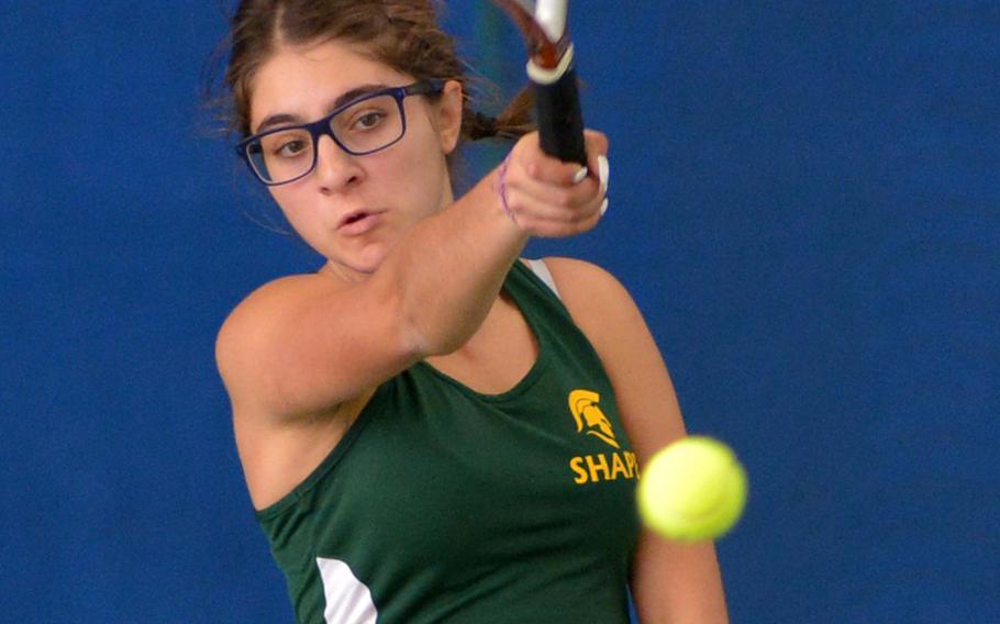 SHAPE's Marianna Kyriou returns a shot against Ramstein's Sophie Tomato in opening-day action at the DODDS-Europe tennis championships in Wiesbaden, Germany, Thursday Oct. 29, 2015. Kyriou won 6-1, 6-2.