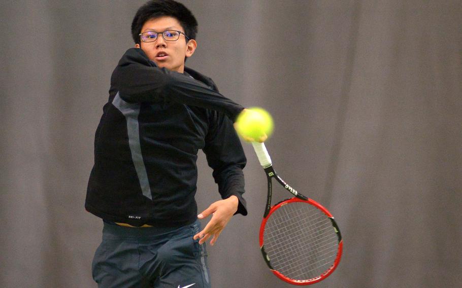 AOSR's Ting Lin returns a shot from ISB's Fabian Sandrup Selvik in the boys singles final at the DODDS-Europe tennis  championships in Wiesbaden, Germany, Saturday, Oct. 31, 2015. Lin lost to the defending champ 6-2, 6-1.