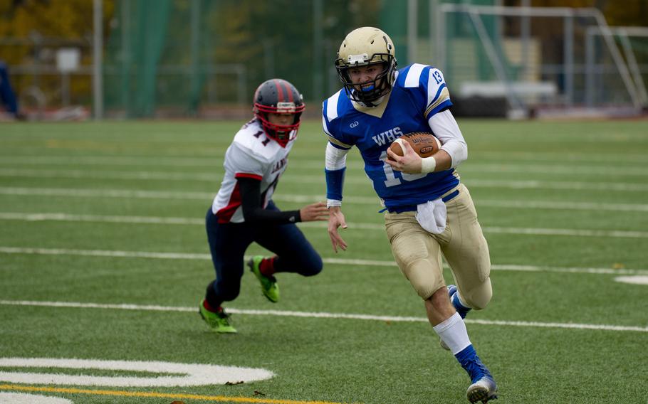 Wiesbaden Warrior Eric Arnold runs the ball during the DODDS-Europe Division I football semifinals at Wiesbaden, Germany, on Saturday, Oct. 31, 2015. The Warriors beat the visiting Lakenheath Lancers 27-16.