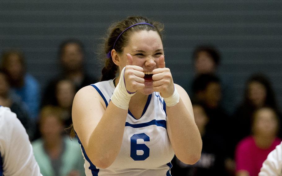 Wiesbaden Warrior Haylee Thompson celebrates after a Warrior point during a DODDS-Europe Division I semifinal match at Ramstein Air Base, Germany, on Friday, Nov. 6, 2015. The Warriors won two sets, but ultimately lost to the Vicenza Cougars 22-25, 26-24, 25-22, 15-25 and 15-9.