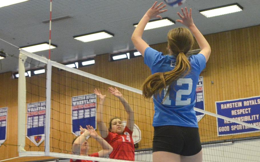 Lillianna Estus, a junior outside hitter from Lakenheath, hits the ball over opponents during the inaugural DODDS-Europe volleyball all star game Saturday, Nov. 14, 2015, at Ramstein Air Base, Germany.