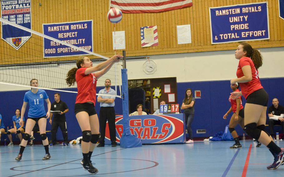 Ashley Colon, a senior setter from Stuttgart, sets up a teammate during the inaugural DODDS-Europe volleyball all star game Saturday, Nov. 14, 2015, at Ramstein Air Basel, Germany.
