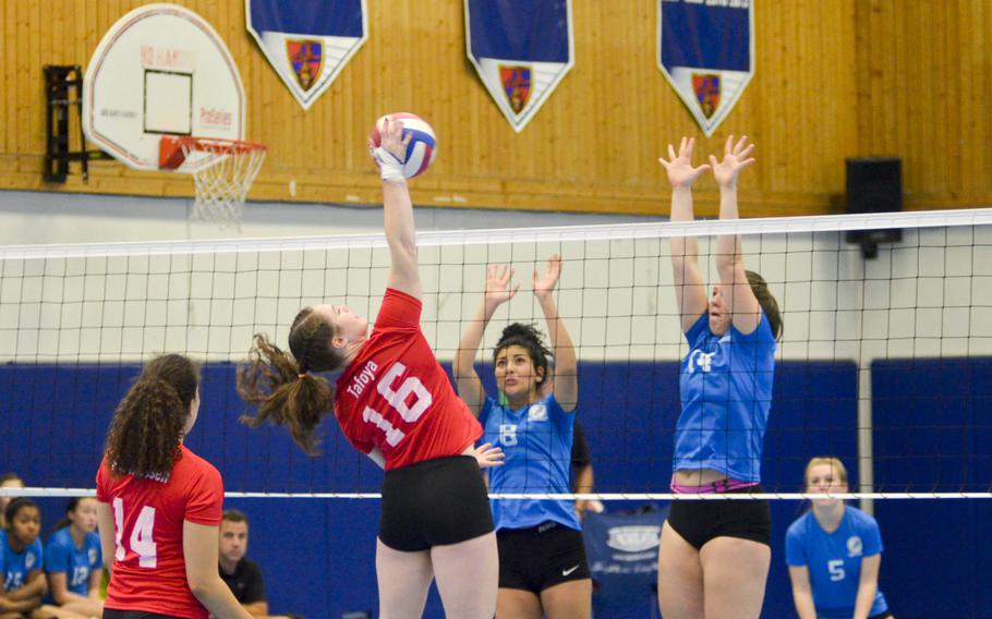 Ellen Tafoya, a senior outside hitter from Wiesbaden, spikes the ball during the inaugural DODDS-Europe volleyball all star game Saturday, Nov. 14, 2015, at Ramstein Air Base, Germany. 